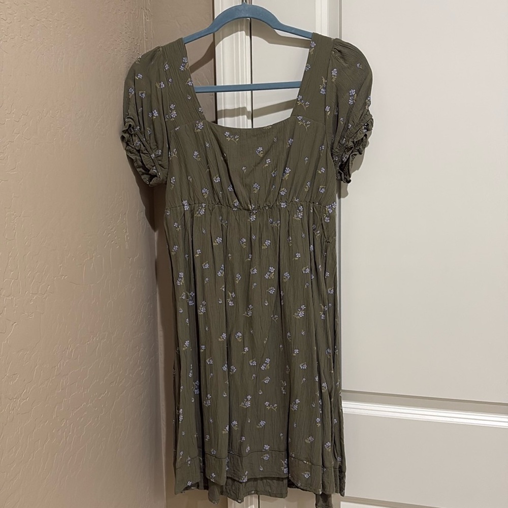 Cute olive green dress with lavender flowers on it.